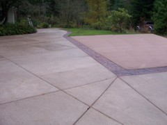 Circles & Borders Stamped Concrete with red broom concrete